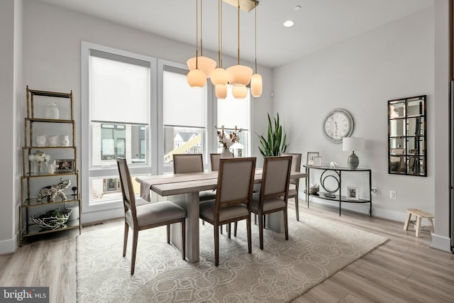 dining area with visible vents, recessed lighting, wood finished floors, and baseboards