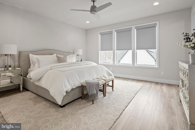 bedroom with a ceiling fan, recessed lighting, baseboards, and light wood finished floors