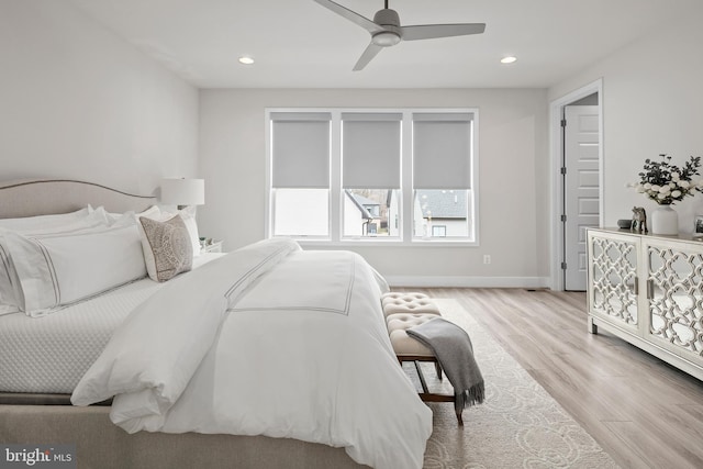 bedroom featuring recessed lighting, baseboards, wood finished floors, and ceiling fan