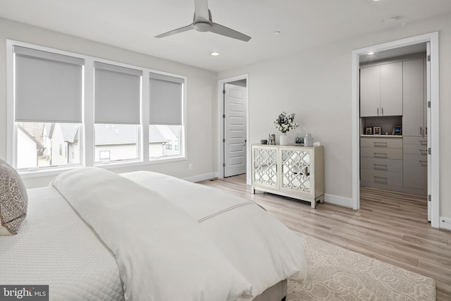 bedroom featuring recessed lighting, baseboards, light wood-style floors, and a ceiling fan