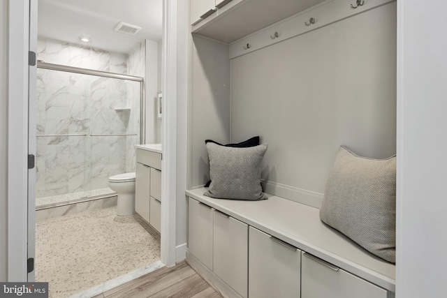 mudroom featuring visible vents and light wood-style floors