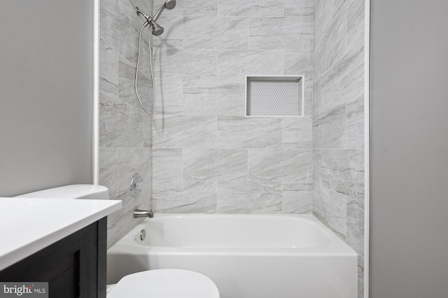 full bathroom featuring shower / washtub combination, vanity, and toilet