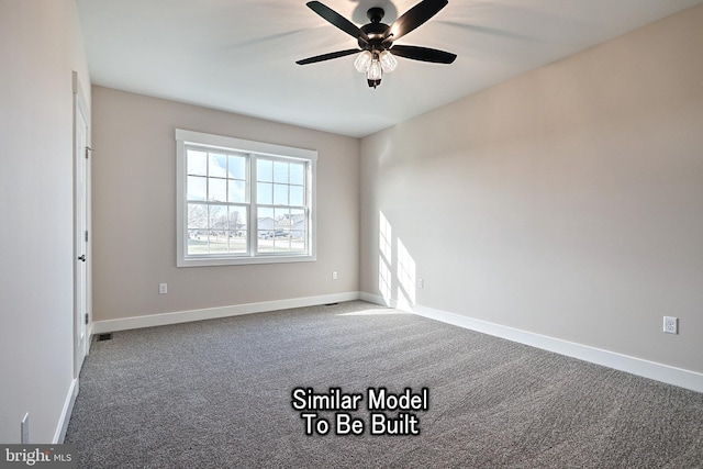 empty room featuring carpet, a ceiling fan, and baseboards