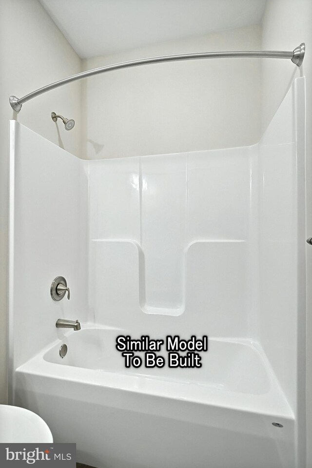 full bathroom featuring toilet and shower / bath combination