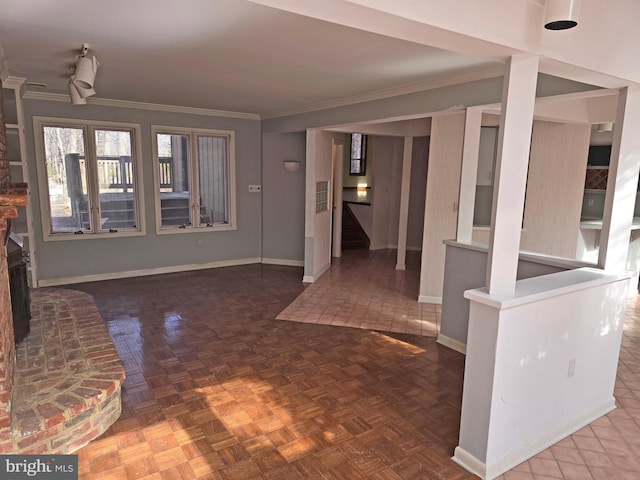 entrance foyer featuring ornamental molding, visible vents, stairway, and baseboards