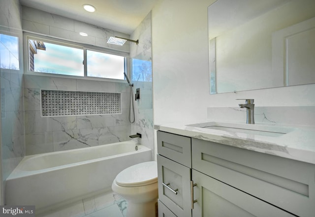 full bathroom featuring bathing tub / shower combination, toilet, marble finish floor, vanity, and recessed lighting