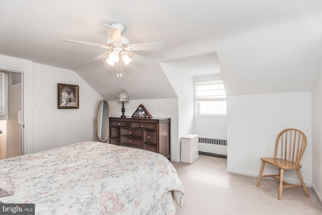 bedroom with lofted ceiling, light colored carpet, radiator heating unit, ceiling fan, and baseboards