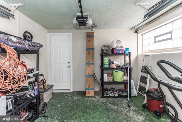 garage featuring a garage door opener