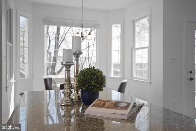 dining room with a chandelier