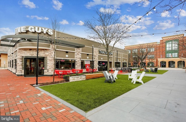 surrounding community featuring a yard