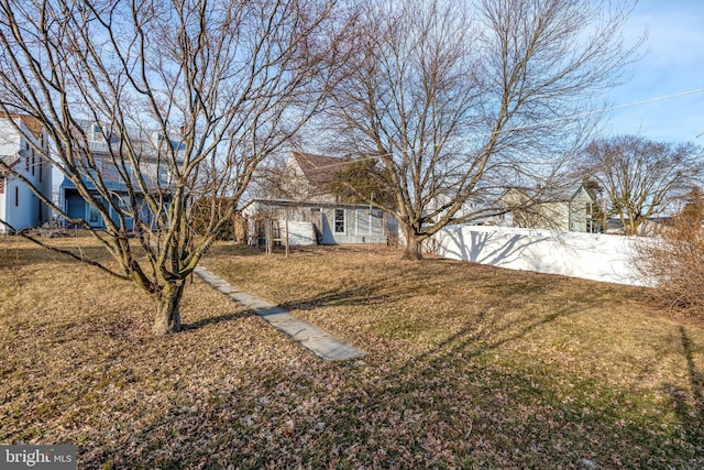 view of yard featuring fence