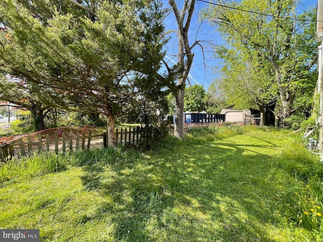 view of yard with fence