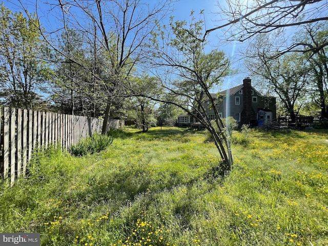 view of yard with fence