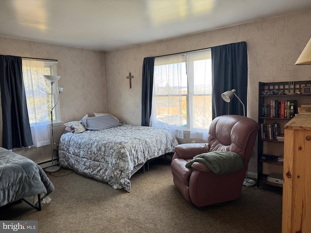 bedroom featuring carpet floors, wallpapered walls, and baseboard heating