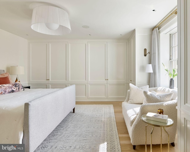 bedroom with light wood-style flooring