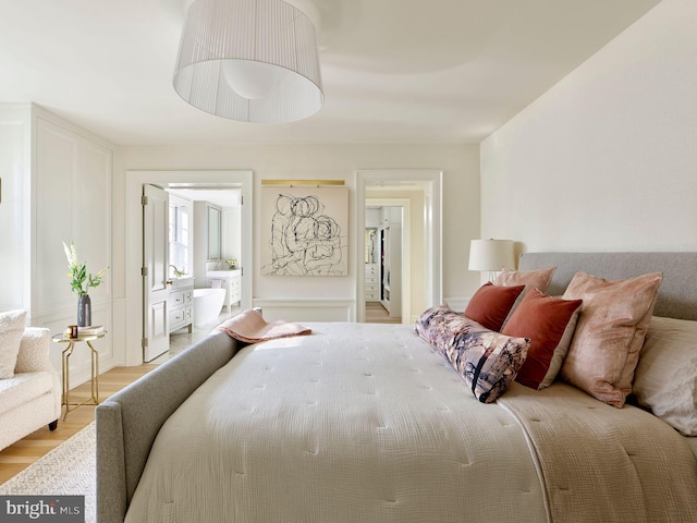 bedroom featuring light wood-type flooring