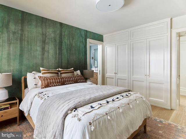 bedroom with light wood-style flooring