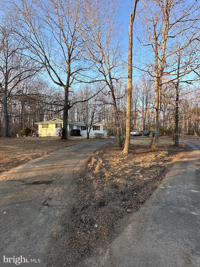 view of front of home featuring aphalt driveway