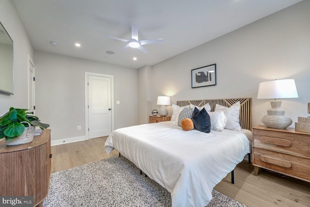 bedroom with light wood-style flooring, baseboards, a ceiling fan, and recessed lighting