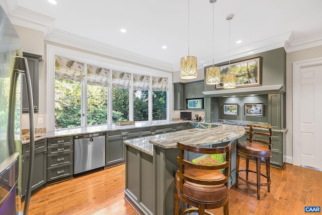 kitchen featuring light stone counters, dishwasher, gray cabinetry, and ornamental molding