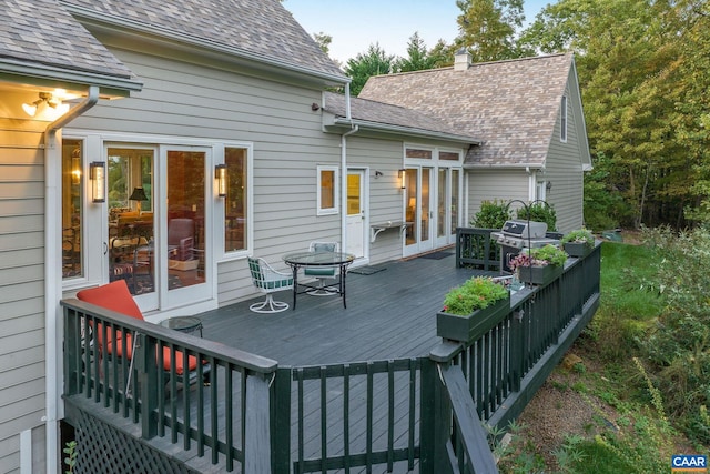 wooden terrace with grilling area