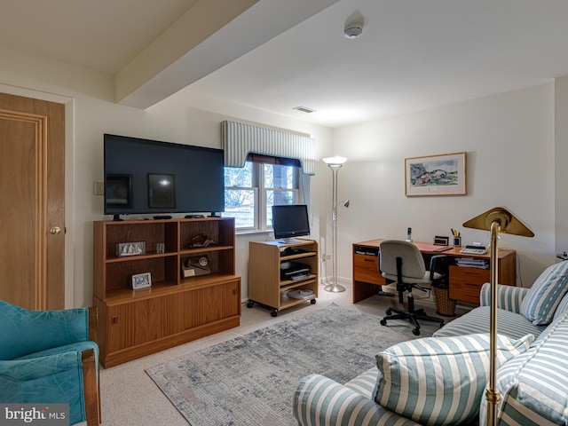 office area with light colored carpet and visible vents