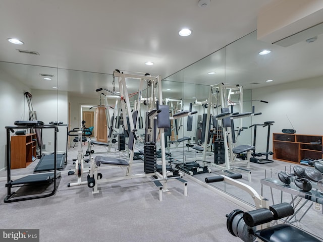 gym featuring recessed lighting and visible vents