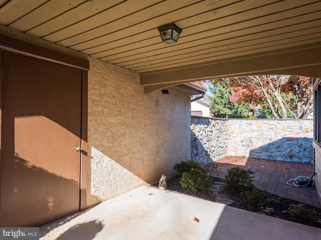 view of patio / terrace featuring fence