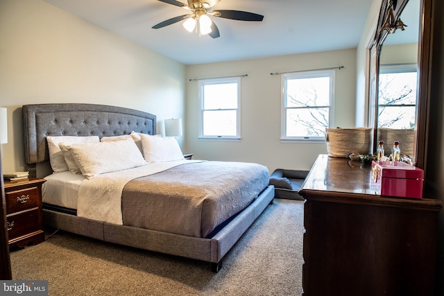 bedroom featuring ceiling fan and carpet floors