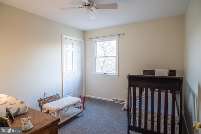 bedroom featuring visible vents, baseboards, ceiling fan, carpet, and a closet