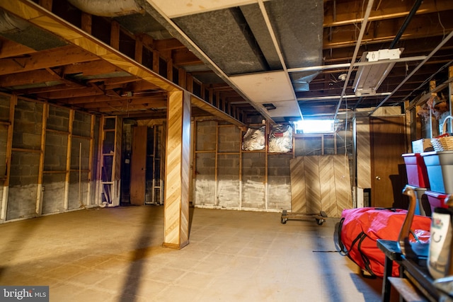 basement featuring tile patterned floors