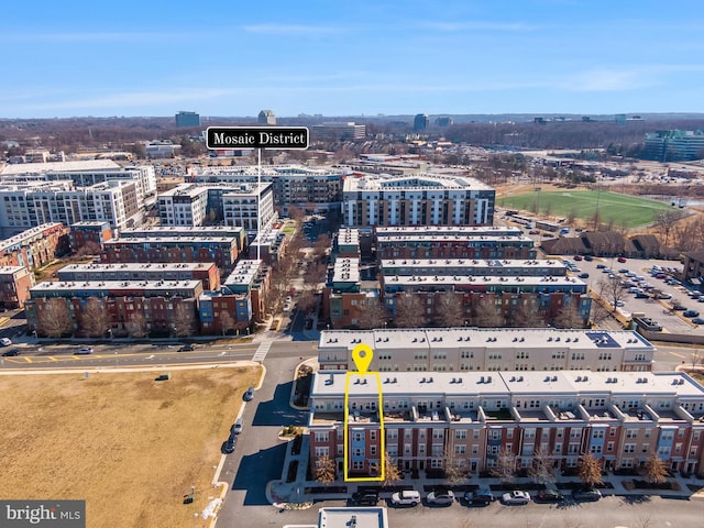 birds eye view of property with a city view