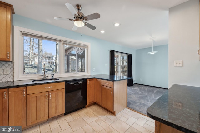 kitchen with black dishwasher, a wealth of natural light, backsplash, a sink, and a peninsula