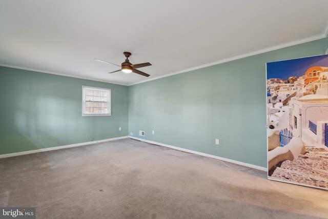 unfurnished bedroom featuring ornamental molding, carpet flooring, and baseboards