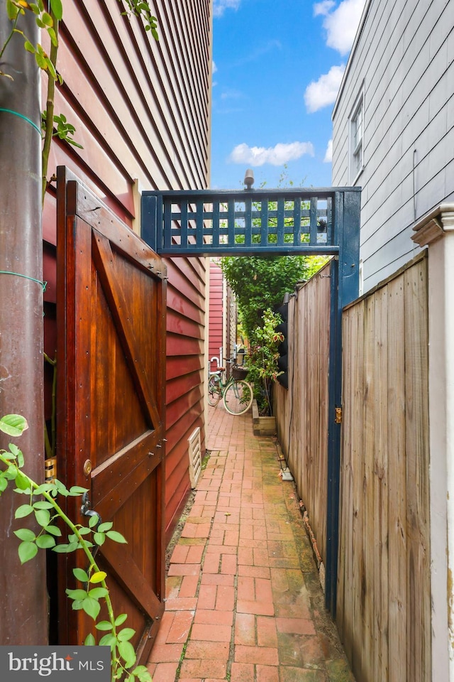 view of patio / terrace with a gate and fence