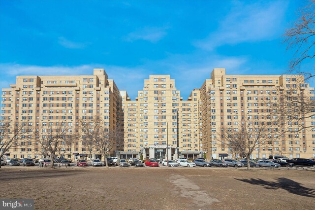 2601 Pennsylvania Ave Unit 252, Philadelphia, PA 19130 - view of building exterior with a view of city and uncovered parking