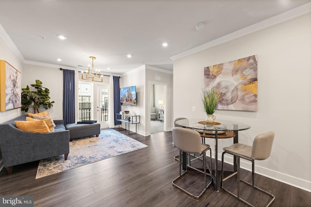 interior space featuring crown molding, recessed lighting, dark wood-type flooring, a chandelier, and baseboards