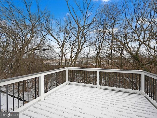 view of snow covered deck