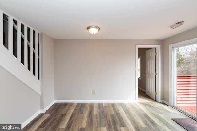 117 Quaker Neck Rd, Salem, NJ 08079 - spare room featuring visible vents, baseboards, and wood finished floors