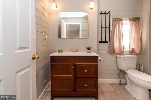 117 Quaker Neck Rd, Salem, NJ 08079 - half bathroom with tile patterned flooring, toilet, vanity, and baseboards