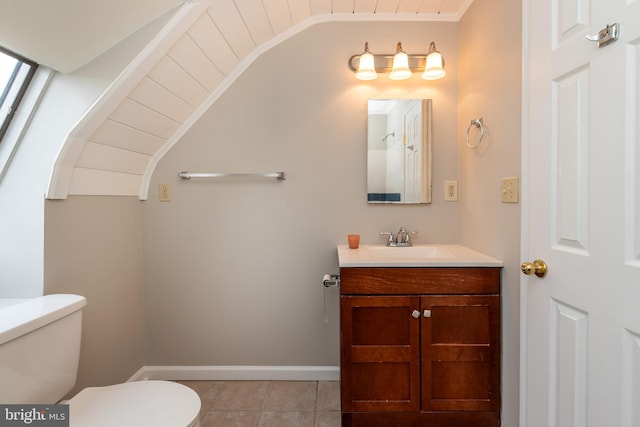 117 Quaker Neck Rd, Salem, NJ 08079 - bathroom featuring toilet, lofted ceiling, tile patterned flooring, baseboards, and vanity