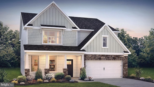 craftsman house featuring stone siding, a shingled roof, board and batten siding, and driveway