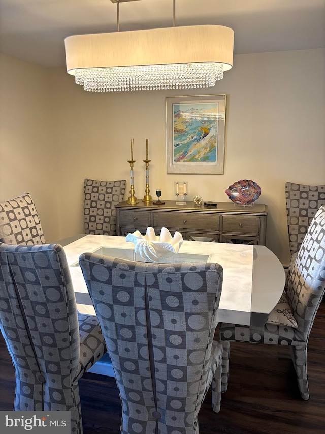 dining space featuring wood finished floors