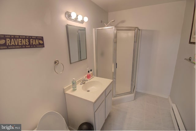 bathroom with a baseboard heating unit, a stall shower, and vanity