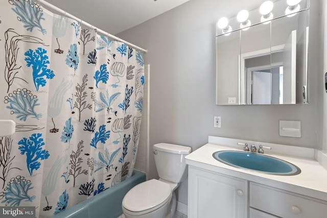 full bathroom featuring toilet, vanity, and shower / bath combo