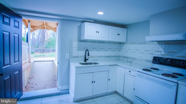 kitchen featuring tasteful backsplash, extractor fan, white cabinets, white electric range, and a sink