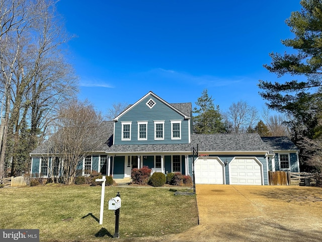 traditional-style home featuring concrete driveway, covered porch, fence, a garage, and a front lawn