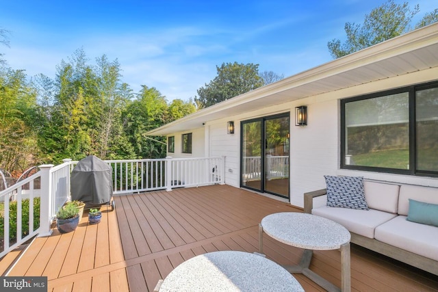 deck featuring an outdoor living space