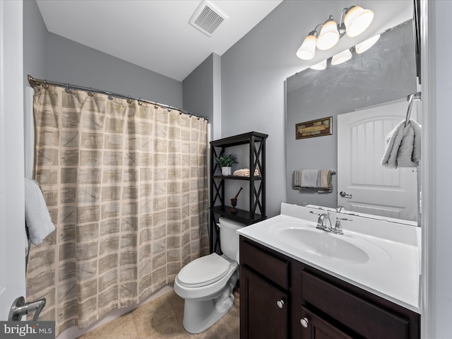bathroom featuring vanity, a shower with shower curtain, visible vents, tile patterned floors, and toilet