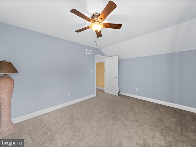 bonus room with carpet, baseboards, visible vents, ceiling fan, and vaulted ceiling